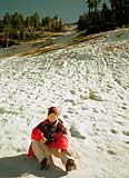 Me sitting on a snow slope at Lake Tahoe, Nevada
