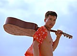 Myanmese model posing with a guitar (Taken at the beach off Changi Jetty, Singapore)