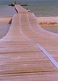 Boardwalk out to sea at the beach in Pulau Langkawi